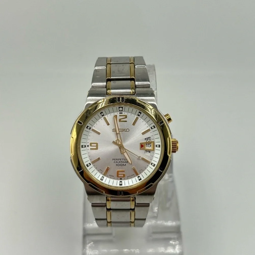 Seiko Men's SNQ076 Perpetual Calendar Two-Tone Watch #555